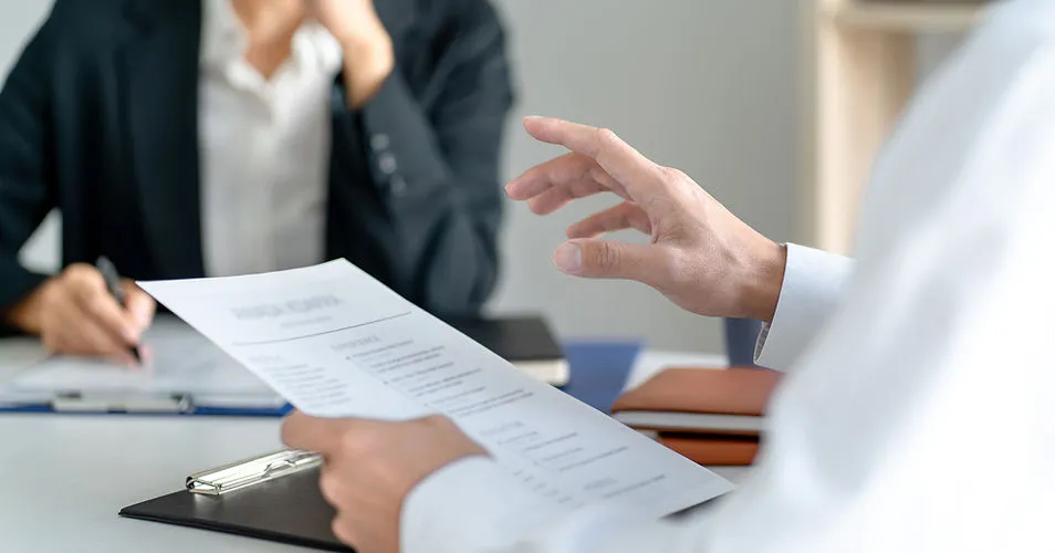 Immigration professional reviewing employment documents